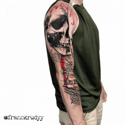 skull and writing trash polka tattoo